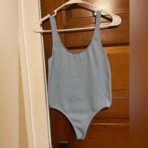 Women’s size small bodysuit one piece tank top light blue Me To We